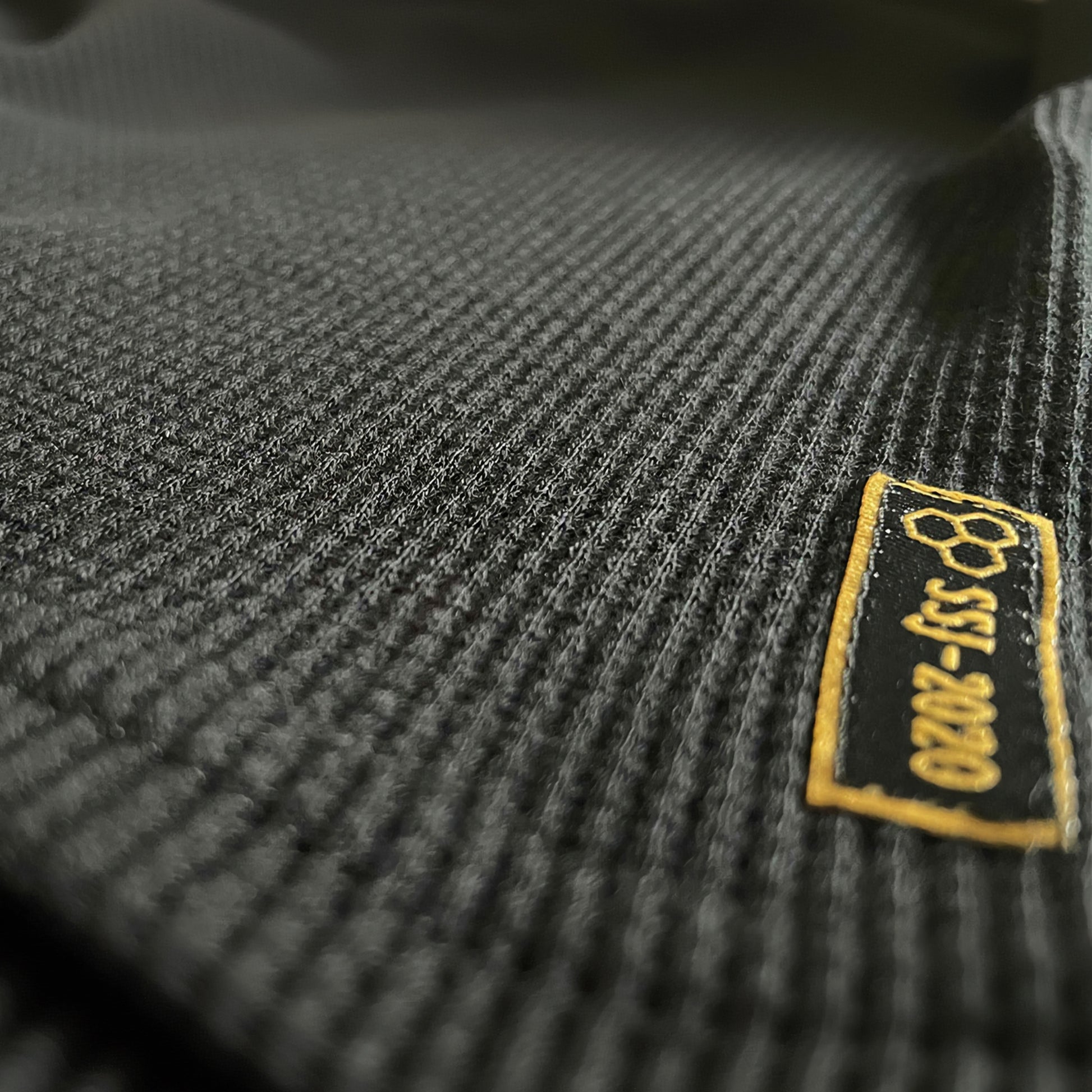 GOLD Fly Zone black waffle-knit cotton fabric and SSJ detail label